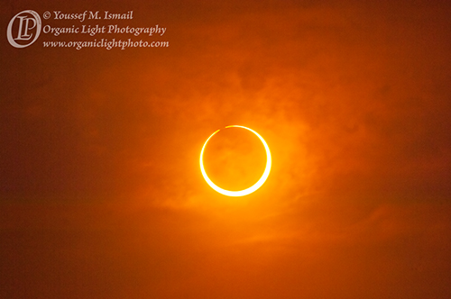 The moon breaks the ring of light as it exits totality
