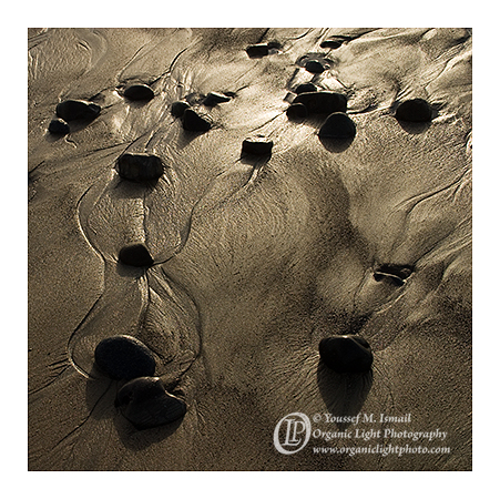 Stones on beach washed by waves